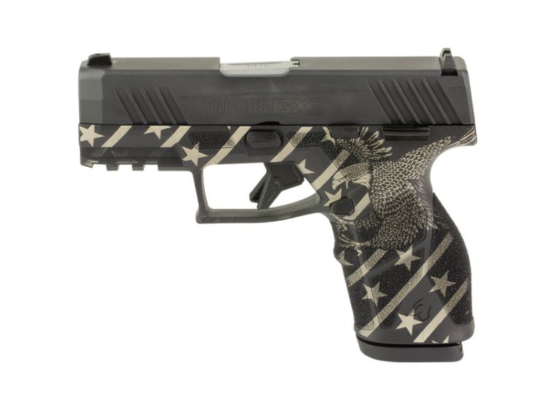 Taurus GX2 9mm compact semi-automatic pistol featuring a custom American Eagle engraved frame, 3.38-inch barrel, polymer frame, and 13-round magazine.