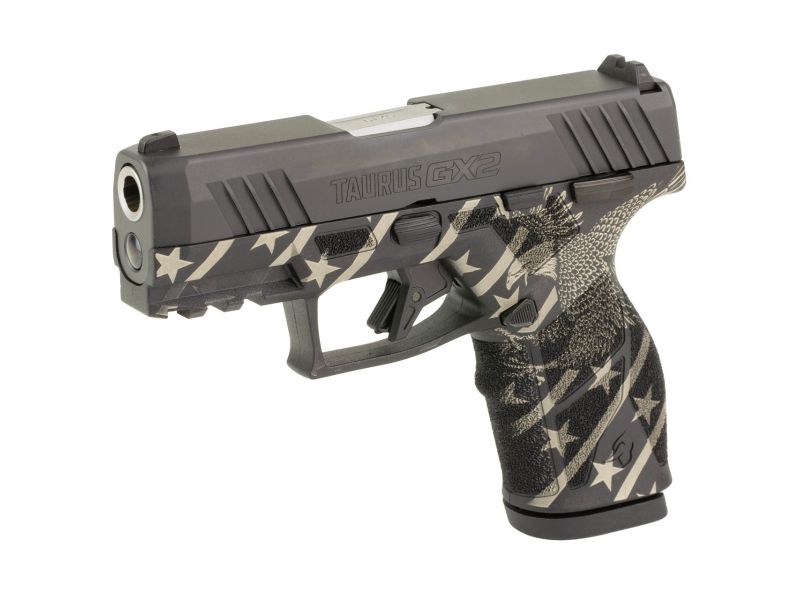 Taurus GX2 9mm compact semi-automatic pistol featuring a custom American Eagle engraved frame, 3.38-inch barrel, polymer frame, and 13-round magazine.